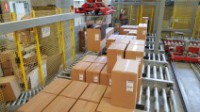 Integrazione software/meccanica di una isola di pallettizzazione e trasporto scatole